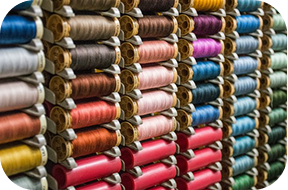 Industrial weaving machinery on the production floor